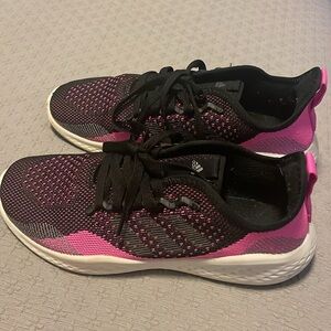 Black and pink adidas bounce shoes